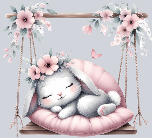Cute Bunny asleep on Swing